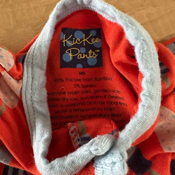 Kickee Pants Red and Blue Footies with Vibrant Patterns - Picture 6 of 7